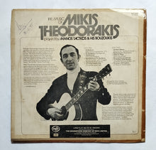 The Music Of Mikis Theodorakis - Played by Manos Tacticos & His Bouzoukis " Including Theme From ' Z ' Zorba's Dance & Prisoner Of Freedom atribute by Tacticos "