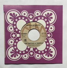 The Captain & Tennille " EP, 45 RPM " Side A : Love Will Keep Us Together , Side B : Gentle Stranger .