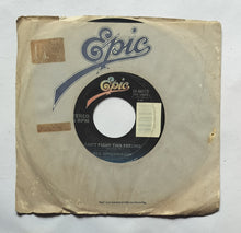 Reo Speedwagon"EP, 45 RPM" Side A : Break His Spell , Side B : Can't Fight This Feeling .