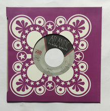 Yes " EP, 45 RPM " Side A : Leave It , Side B : Owner Of A Lonely Heart .