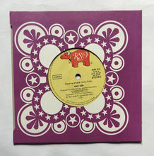 Andy Gibb " EP, 45 RPM "            Side A : An Everlasting Love             ( Barry Gibb ) Side B : Flowing Rivers ( Andy Gibb )