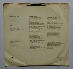 Level 42 " Lessons in Love , Hot Water ( live ) " ( EP 45 RPM )